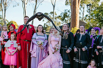 Marry Me Marilyn_Sarah & Gareth's Medieval Inspired Wedding Robertson Gardens Nathan Viking Eagle brings the Rings